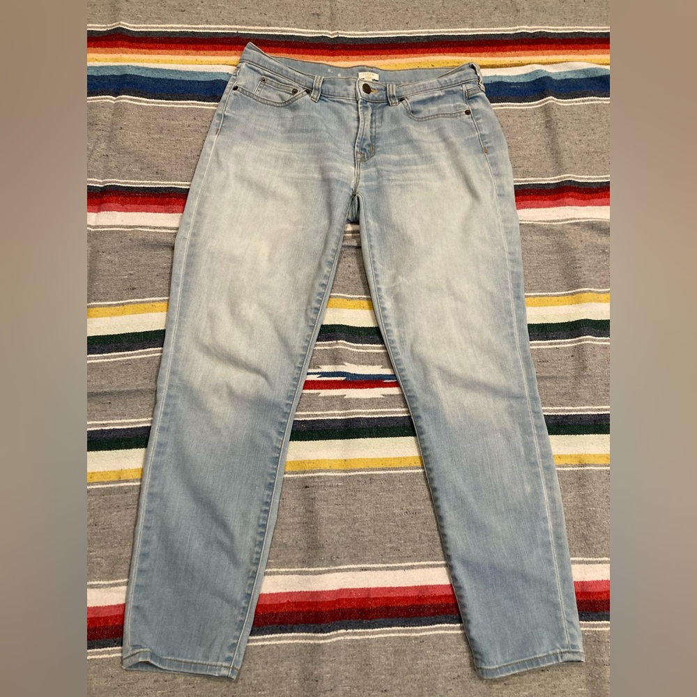J Crew light wash denim stretch jeans, slightly distressed, no rips, size 27